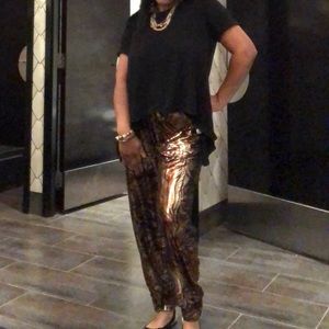 Snake or Lion printed metallic hue lamé joggers sold 🎊